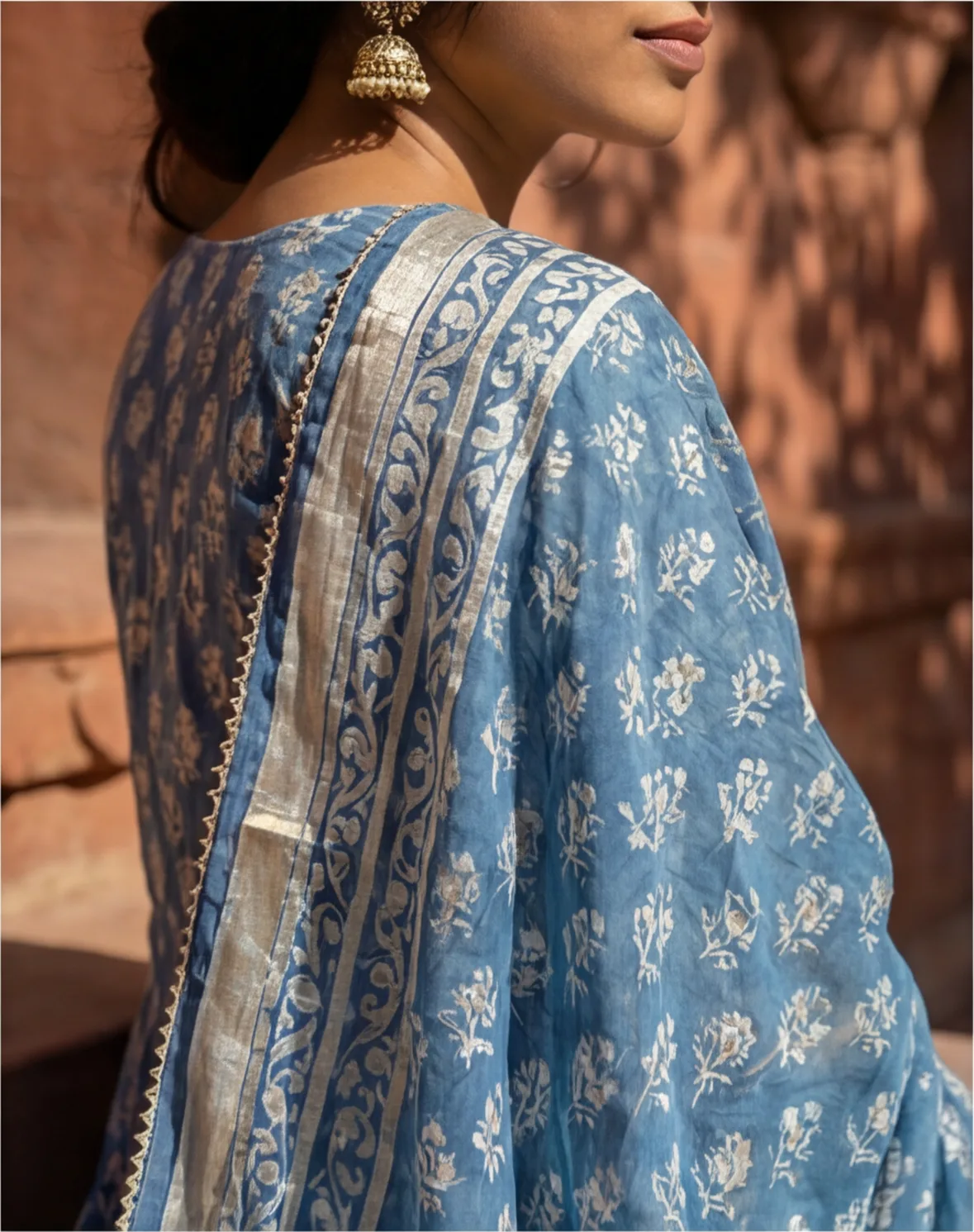 Mokapot AI photoshoot - earring and embroidered trim detail